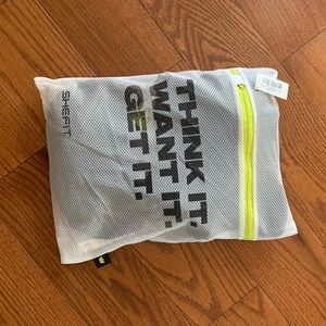 SHEFIT sports bra and 2 shirts